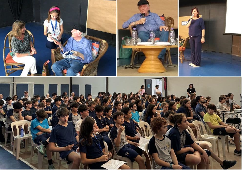 Entrevista com sobrevivente do Holocausto no auditório, com alunos dos Anos Finais na plateia