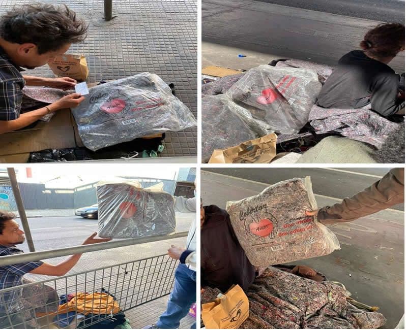 Pessoas em situação de rua recebem cobertores embalados doados pela campanha