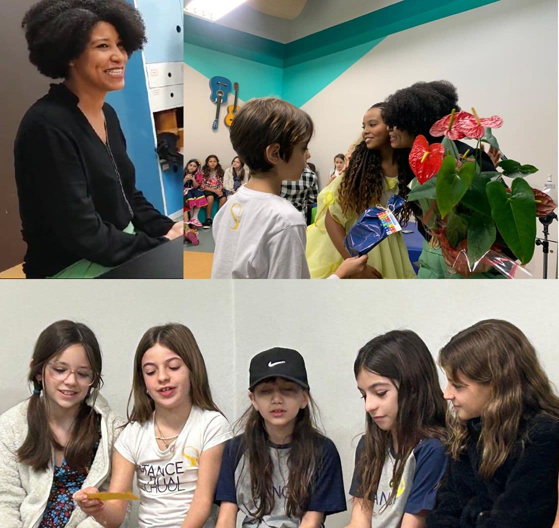 Entrevista de alunos do 4º ano com a cientista social Laís Fernanda de Souza, que recebe flores e um presente